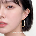 Irregular Twisted Large Hoop Earrings In Gold And Silver Tone view 2