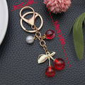 Twelve Resin Cherry Strawberry and Peach Metal Keychain Designs view 7