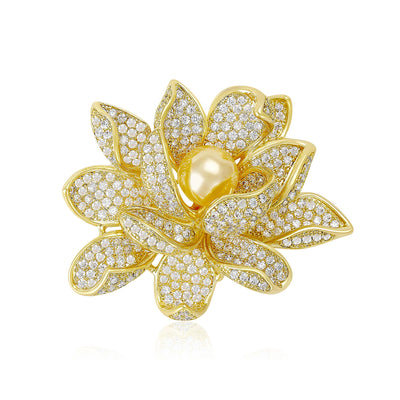 Front view of crystal lotus pearl brooch against a white background.