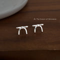 Silver Tone Sculpted Long Tail Ribbon Bow Stud Earrings For Women view 1