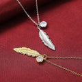Feather Crystal Pendant Necklace in Silver and Gold Tones view 3