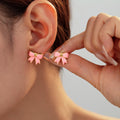 Enamel Bow Stud Earrings Pink White Blue Gold and Steel Frames view 3