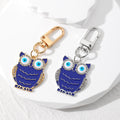 Gold and Silver Tone Navy Owl Evil Eye Clip Keychains view 1