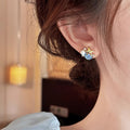 Blue Star And Pearl Accent Gold Tone Floral Stud Earrings view 3