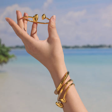 Polished Open Cuff Bangle With Hollow Triangle Ends