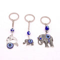 Silver Tone Elephant and Dolphin Blue Evil Eye Split Ring Keychains view 5