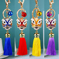 Lion Dance Head Tassel Keychains in Twenty Enamel and Jeweled Options view 1