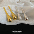 Long Teardrop Stud Earrings in Gold and Silver Tones view 4