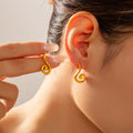 Spiral Swirl Geometric Stud Earrings Gold Steel Pair view 1