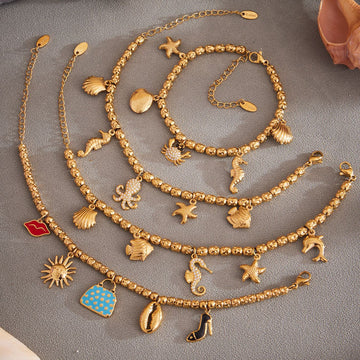 Marine and Fashion Charm Bracelets in Gold Silver and Two Tone