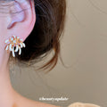 White Enamel Firework Crystal Stud Earrings in Gold Tone view 3