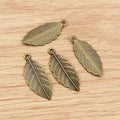 Detailed Leaf Pendant Charms in Silver and Bronze Tones view 2