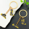 Black Gold Western Hat and Boot Star Metal Keychain Set view 1