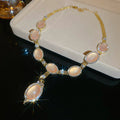 Gold Pink Cats Eye Oval Crystal Halo Necklace and Drop Earrings view 7