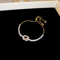 Gold Tone Crystal Slider Bracelet With Pale Pink Rectangular Center Stone view 6