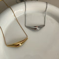 Polished Curved Bar Pendant Necklace in Gold and Silver Tones view 2