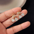 Gold Cherry Stud Earrings White Glitter Orbs CZ Leaves view 4