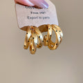 Gold Tone Triple Hoop Earrings With Black Dot Details view 6