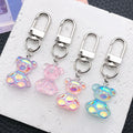 Four Iridescent Translucent Bear Keychains with Metal Hardware view 1