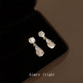 Gold Tone Clear Round And Teardrop Faceted Stone Drop Stud Earrings view 3