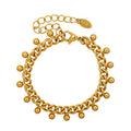 Gold Tone Curb Bracelet With Ball Bead Dangles Lobster Clasp view 5