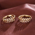 Leaf Motif Hoop Earrings In Three Polished Metal Tones view 2