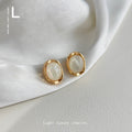 Gold Irregular Bezel Oval Cabochon Stud Earrings Pair view 4