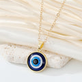Round Blue Evil Eye Pendant Necklaces in Gold and Silver Tone Sizes view 8