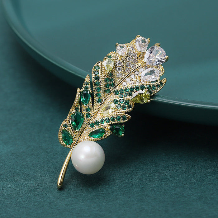 Crystal Feather With Pearl Brooch With Polished Metal And Sculpted Decorative Details