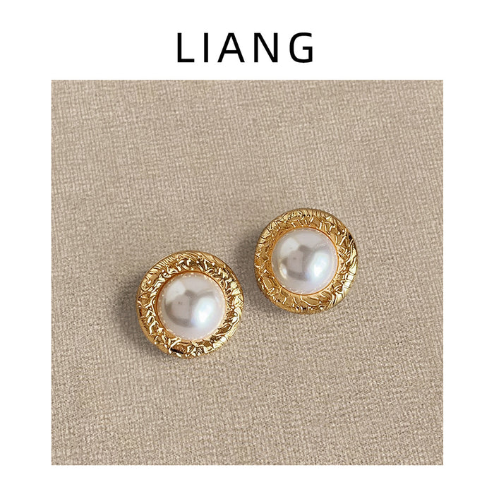 Gold Textured Round Pearl Stud Earrings Circular Rims