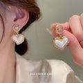 Gold Tone Pearl Stud And White Heart Drop Earrings view 4
