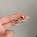 Gold Tone Heart Top And White Pearl Row Ear Jacket Stud Earrings view 1