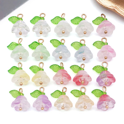 Metallic bead and flower beads arranged on a light background