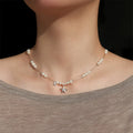 Pearl Strand Necklace with Silver Tone Star Pendant view 3