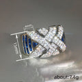 Silver Cross Weave Ring Clear Pave Blue Baguette Stones view 4