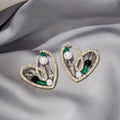 Gold Heart Frame Pearl Crystal Stud Earrings Green Accents view 1
