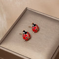 Six Red Black and Pearl Look Ladybug Novelty Earrings view 3