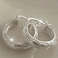 Silver Floral Engraved Thick Huggie Hoop Earrings Pair view 1