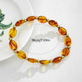 Oval Glass Bead Stretch Bracelet with Gold-Tone Spacers view 3