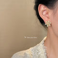 Gold Snowflake Flower Stud Earrings Champagne Center Stones view 2