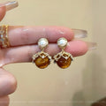Tiger Eye Pearl Frame Drop Earrings with Distinctive Textured Details view 1