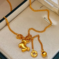 Gold Tone Horse Coin and Bell Tassel Pendant Necklace view 2