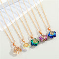 Gold Tone Flower Crystal Tree of Life Pendant Necklaces in Five Colors view 3
