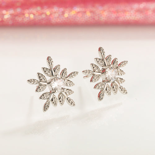 Silver Tone Layered Snowflake Clear Stone Stud Earrings - angled detail view