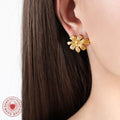 Asymmetric Ribbed Flower Stud Earrings Gold And Steel view 3