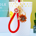 Jeweled Sunflower Keychains in Orange and Yellow with Fortune Loops view 3