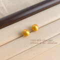 Matte Gold Tone Round Ball Stud Earrings In Five Graduated Sizes view 4