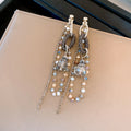Blue Crystal Chain Tassel Earrings In Two Silver Tone Styles view 7