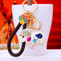 White Crystal Sheep Keychains With Nine Pictured Wrist Strap Options view 7