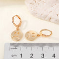 Frowning Face Huggie Drop Earrings in Gold and Silver Tone view 4
